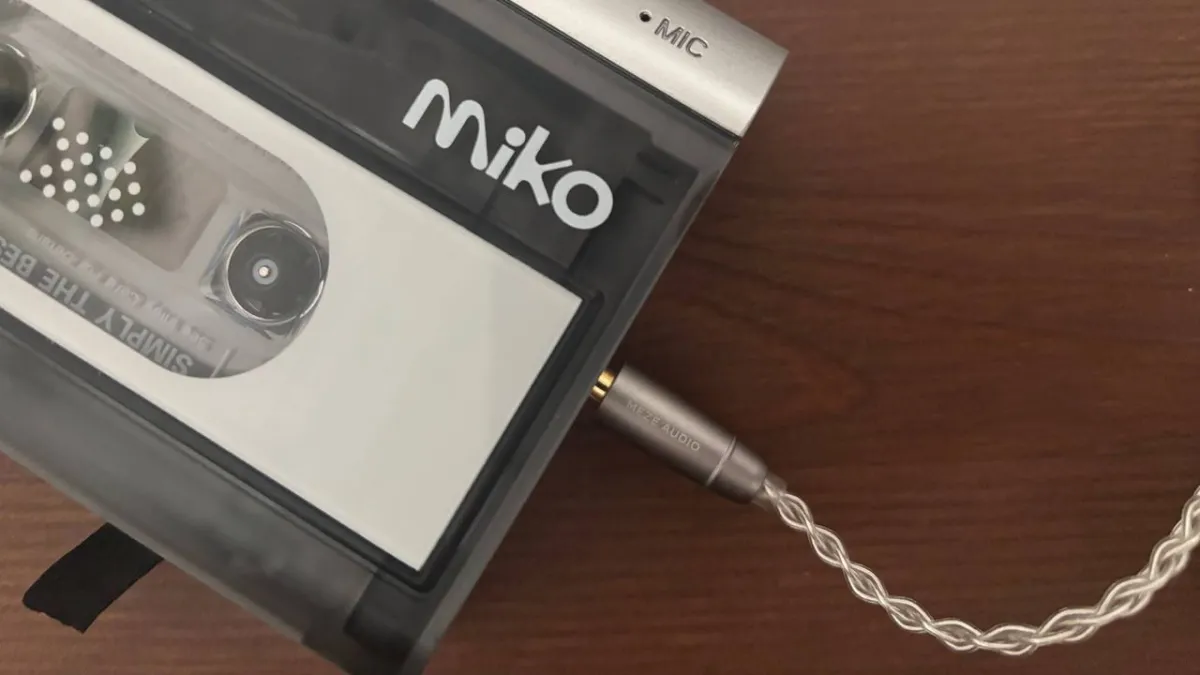 Modern portable cassette player with integrated Bluetooth connectivity and analog tape mechanism