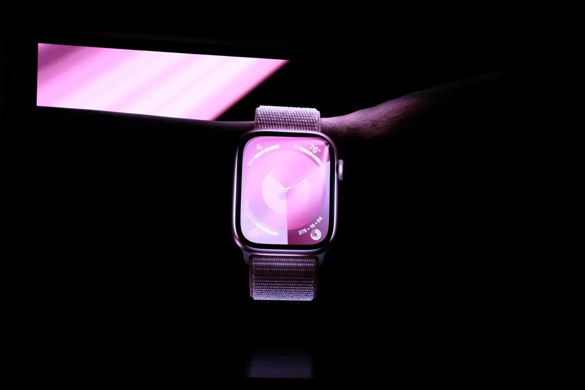 Apple iPad and Apple Watch devices display software update exclusion notices.