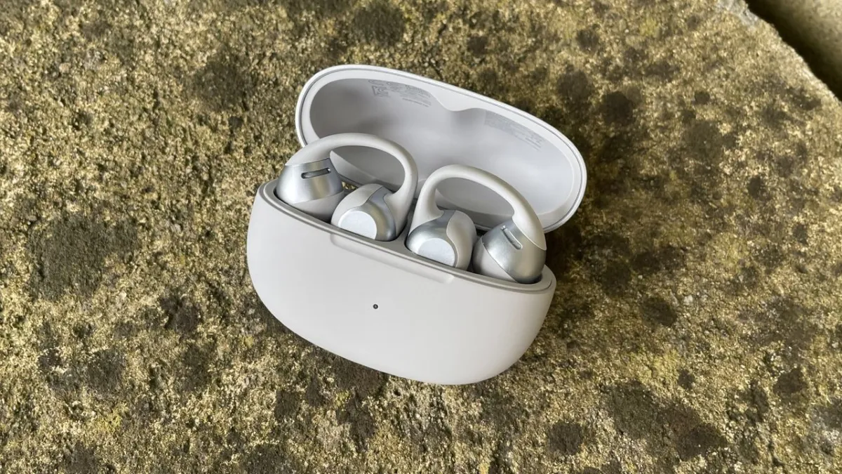 Shokz OpenDots 2 open-ear headphones featuring a clip-on design, dual drivers, and multipoint connectivity.