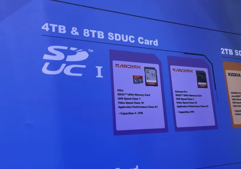 Technical specification sheets for SanDisk 4TB and 8TB SDUC memory cards are displayed at Computex 2026.