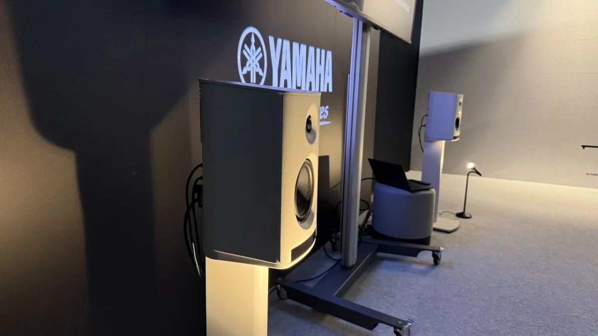 The Yamaha NX-70A wireless speakers feature a compact cylindrical design and a minimalist front panel.