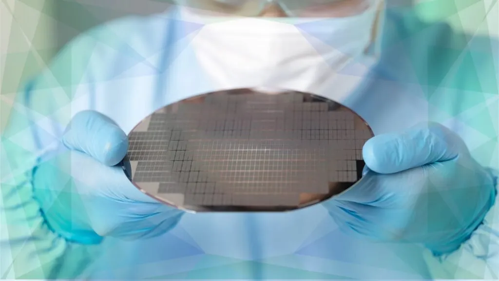 Nanoprinting equipment processes silicon wafers to manufacture photonic chips for light-based computing.
