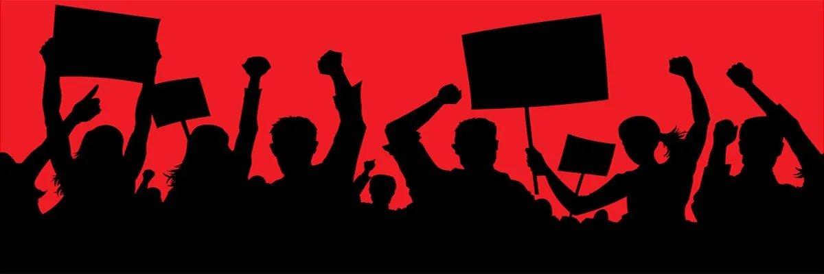 Protesters gather near a large datacenter facility surrounded by power grid infrastructure