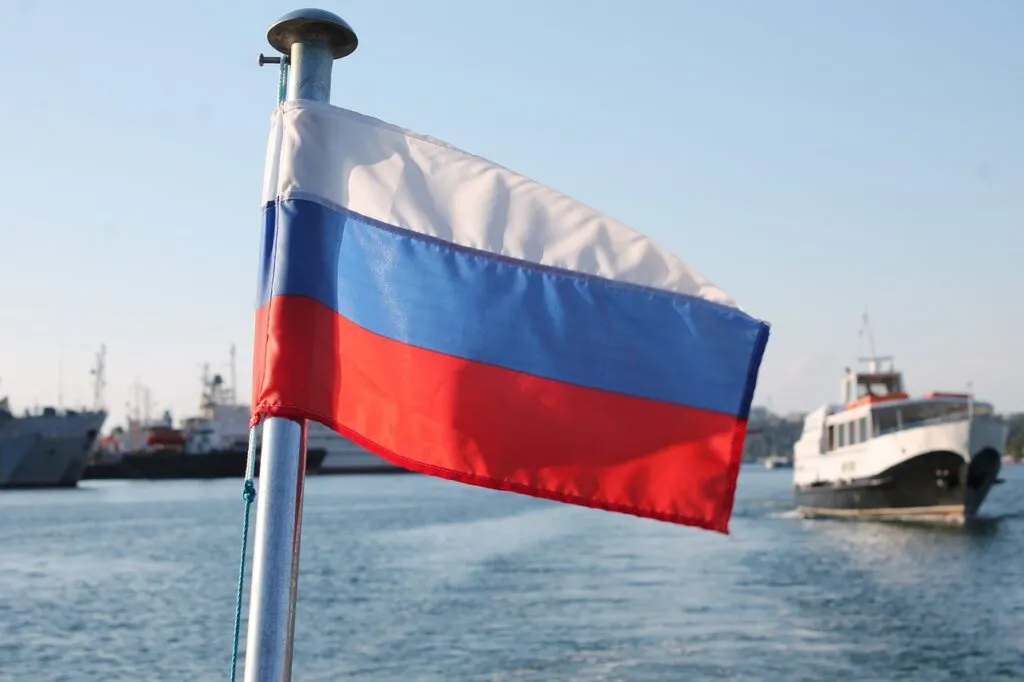 A Russian warship fires warning shots near a British yacht in the English Channel.