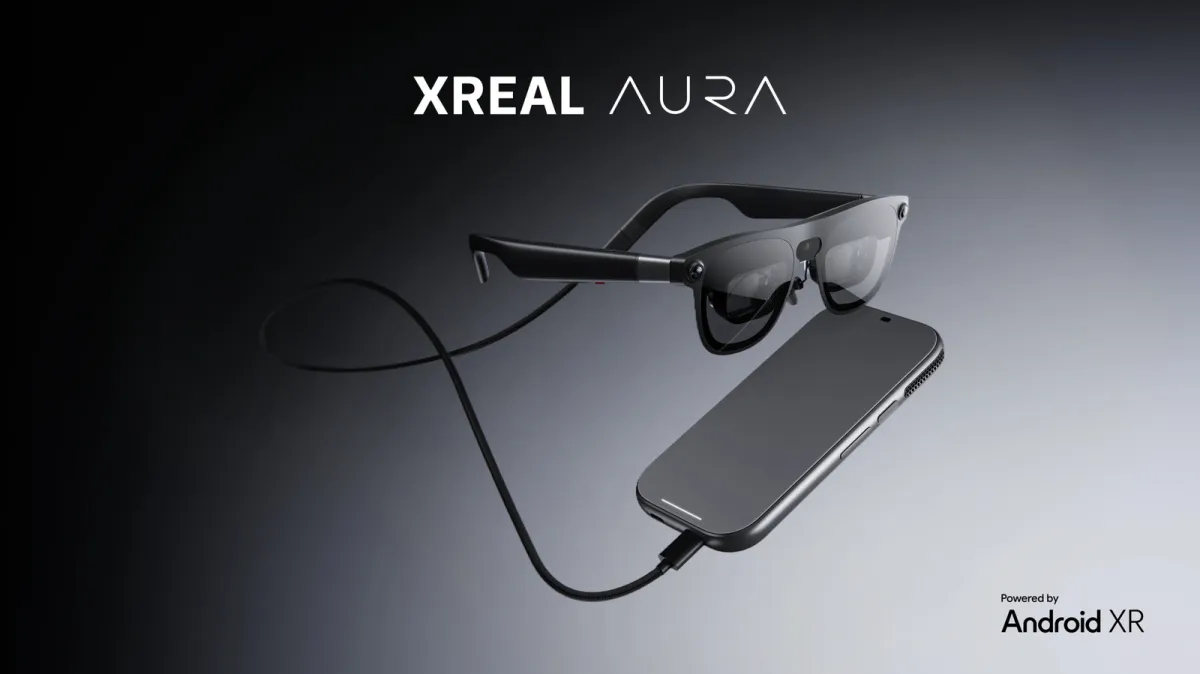 The Xreal Aura Android XR glasses are displayed at the Augmented World Expo alongside reservation options and pricing deta...
