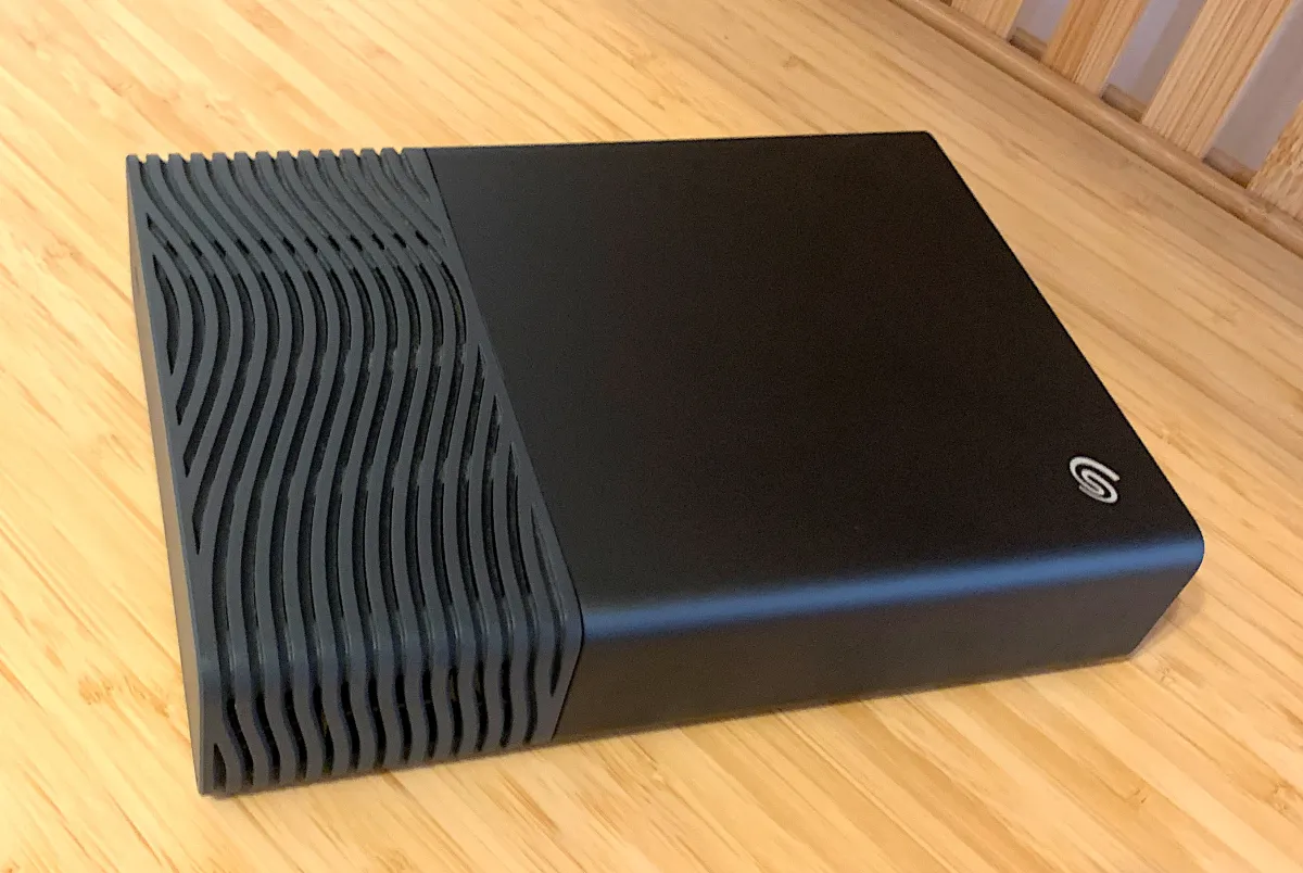 Seagate One Touch external hard drive with attached USB cable