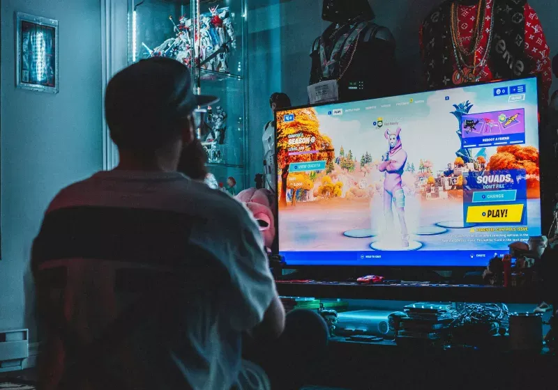 A diverse group of Americans plays video games on home consoles and mobile devices.
