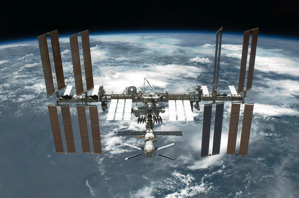 Astronauts take shelter in a secure module of the International Space Station after an air leak is detected.