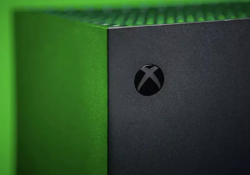 The Xbox logo appears on the exterior of a corporate office building.