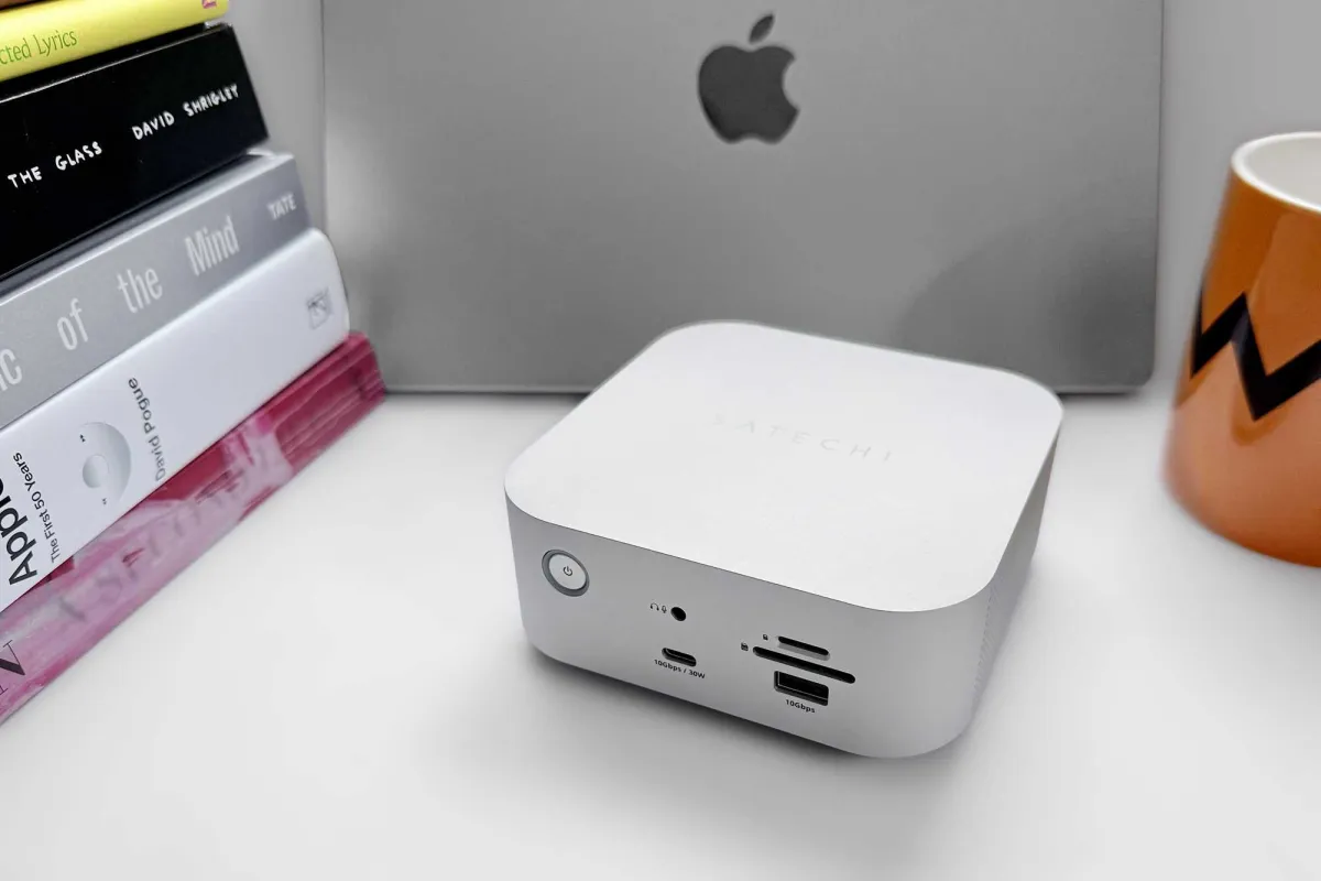 The silver Satechi Thunderbolt 5 CubeDock chassis displays four Thunderbolt 5 ports and a compact design.