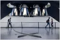 SpaceX logo appears alongside financial graphics showing sovereign wealth fund investments in the SpaceX IPO