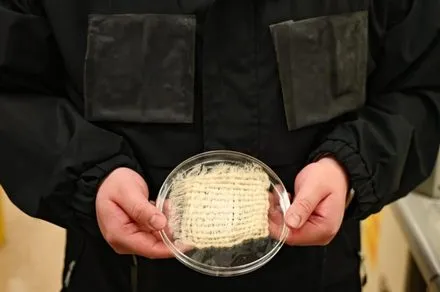 A person wears a jacket constructed from hydrogel fibers that extracts drinking water from the air.