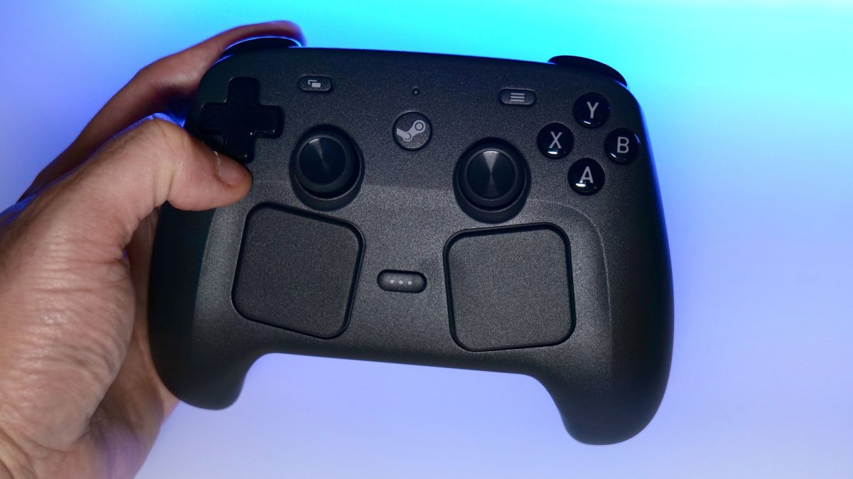 The Steam Controller hardware sits alongside retail packaging during the initial launch period.