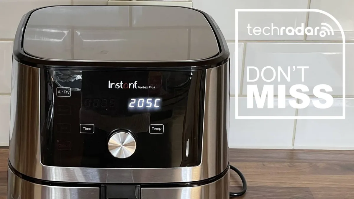 A six quart convection air fryer sits on a kitchen counter with its wire basket visible.