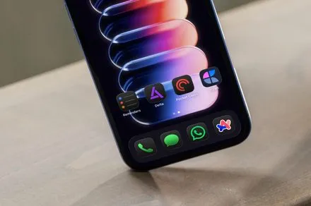 iPhone screen displaying essential productivity and media application icons