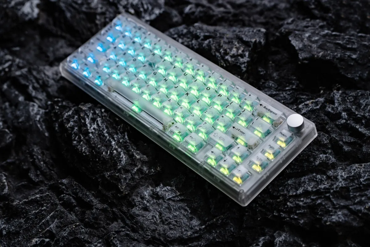 Epomaker HE65 V2 TMR keyboard with tunnel magnetoresistance sensors and a compact 65 percent translucent chassis.