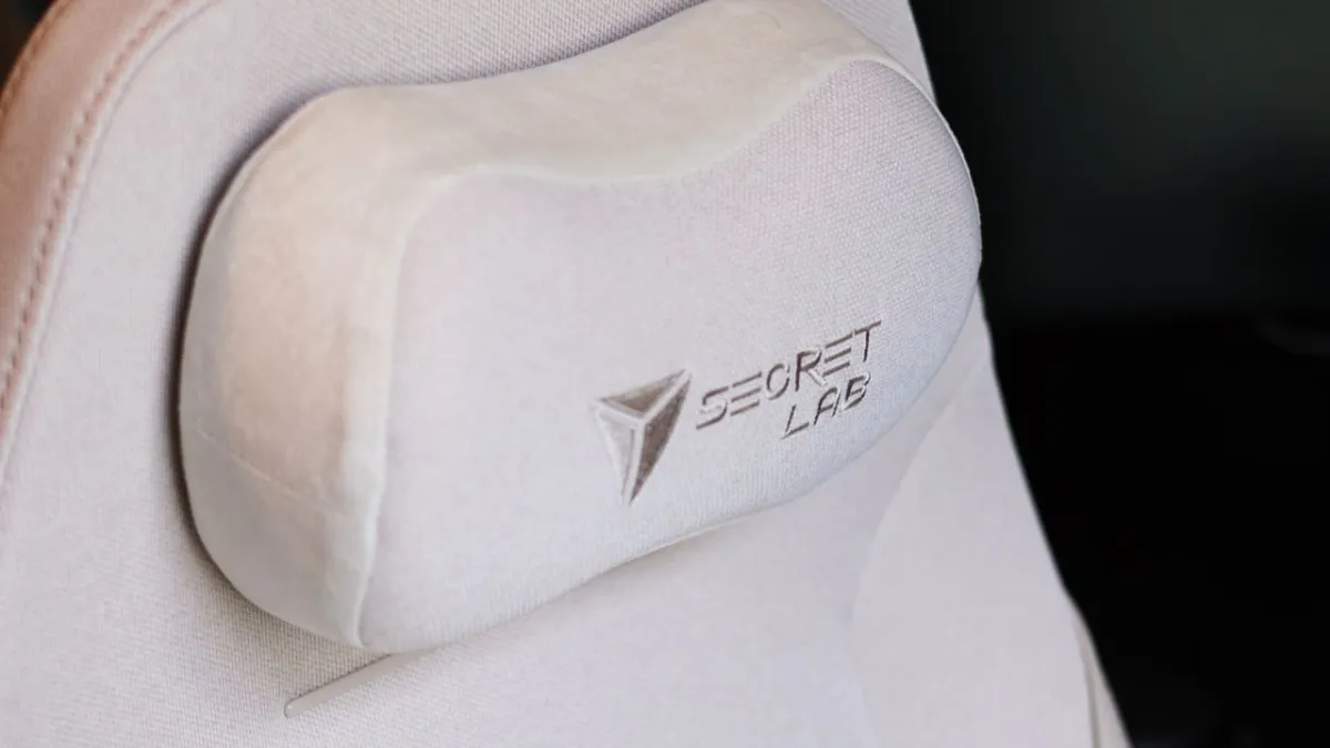 The Secretlab Atlas ergonomic chair features a dynamic rocking mechanism and fixed lumbar support.