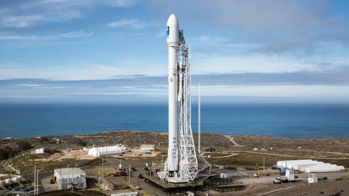 SpaceX rocket sits on the launch pad with financial charts in the background.