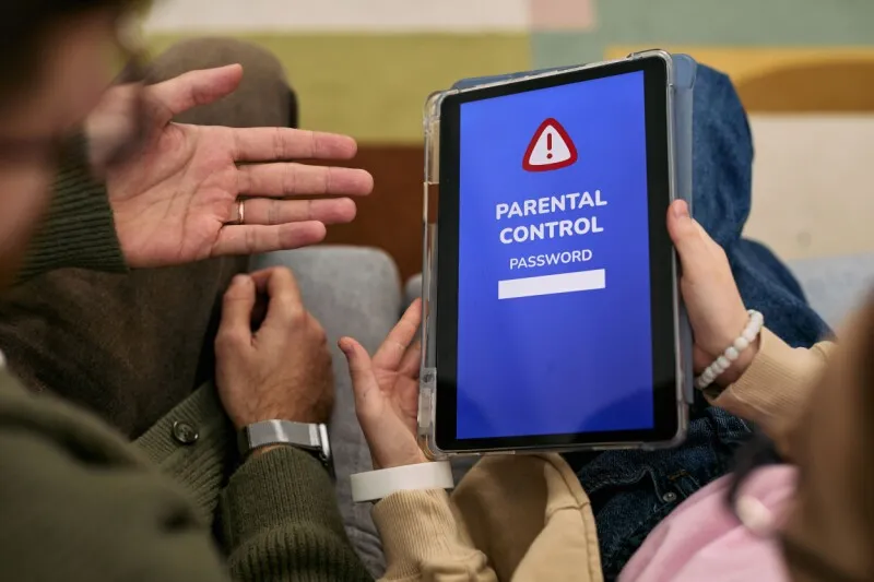 iPhone screen displaying new iOS parental control settings for app approvals and screen time management