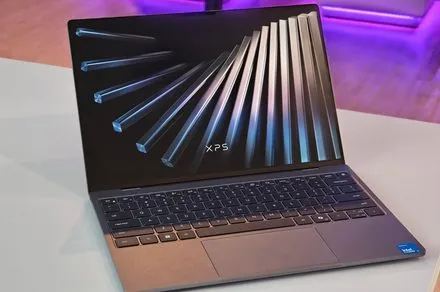 Dell and Acer budget Windows laptops showcasing aluminum construction and high refresh displays at Computex 2026.