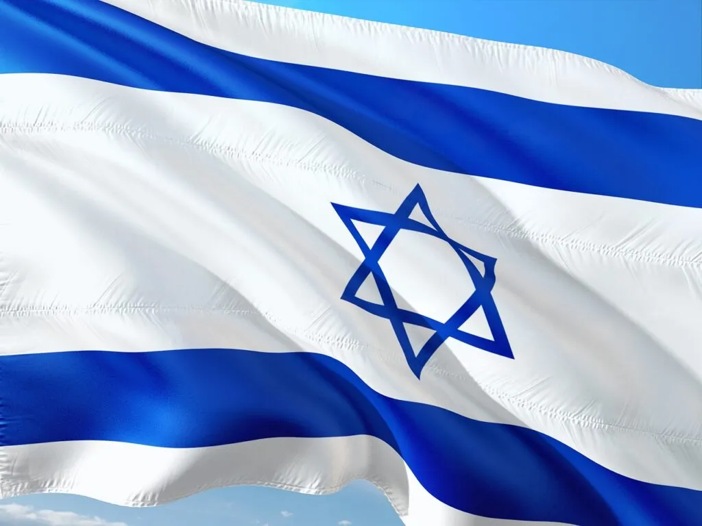 Israeli legislators debate a bill to exempt ultra-Orthodox men from military conscription amid public protests.