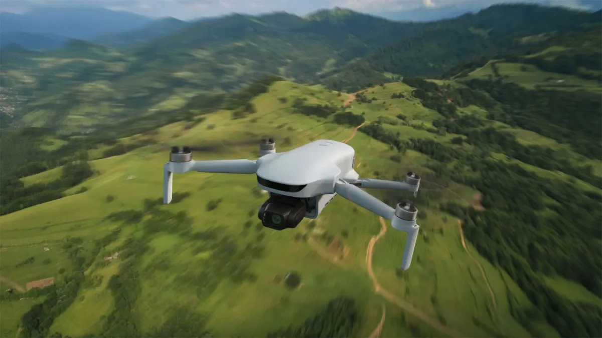 The Potensic Atom 3 drone rests on a surface to display its larger camera sensor and extended battery.