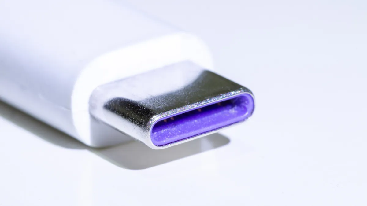 This purple USB connector historically indicated Huawei SuperCharge fast charging before industry standards shifted to ora...
