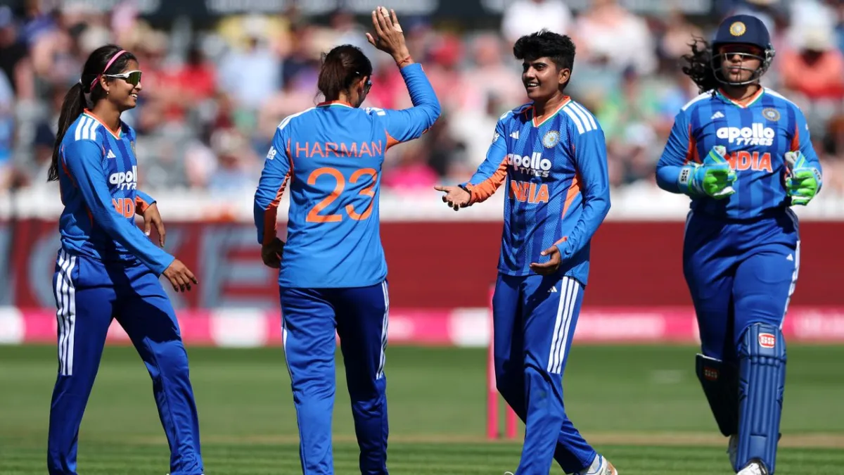 A television screen displays a live broadcast of the India versus Pakistan women T20 World Cup 2026 match.