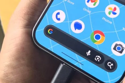 Google Messages app interface displaying the AI tap to draft feature generating a contextual text reply