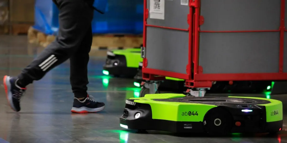 An autonomous warehouse robot processes spoken instructions for Amazon's European logistics network.