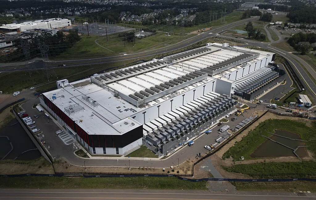 Data center cooling towers and water recycling systems manage server heat while addressing regional water scarcity.