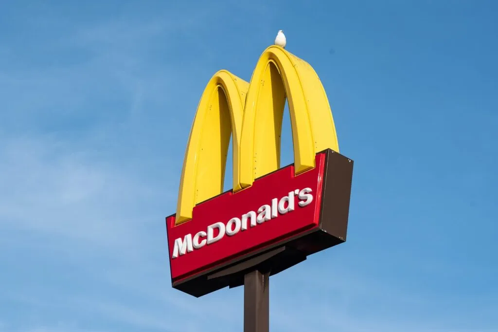 McDonald's storefront displaying climate neutrality advertising subject to German court legal review.