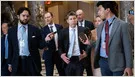 US officials and AI company representatives discuss potential government share acquisition in technology firms.
