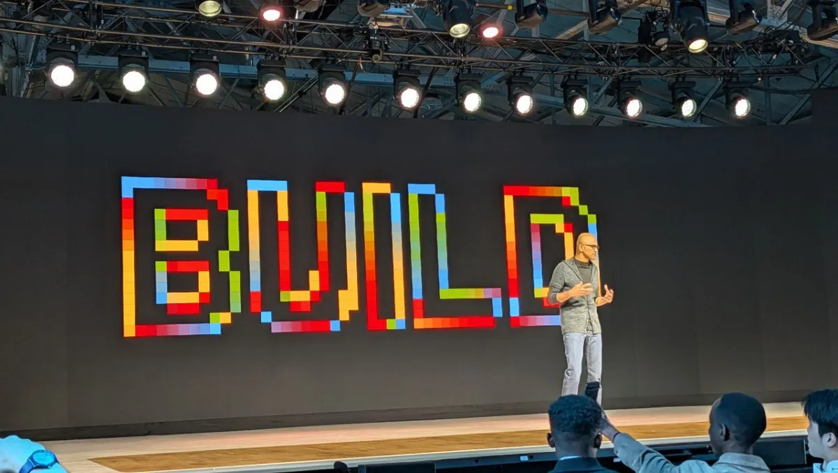 A presentation slide displays Microsoft Build 2026 updates on artificial intelligence security and quantum computing roadm...