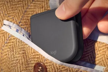 The Logitech Mobi Fold mouse is displayed in folded and extended positions to illustrate its compact design.