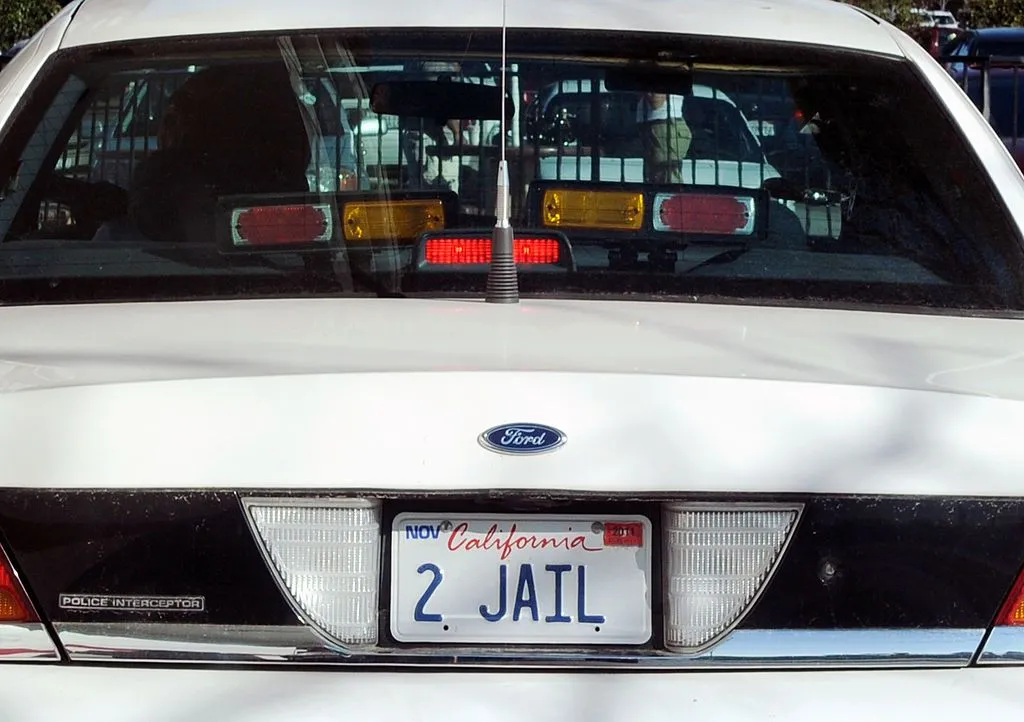 Law enforcement officers review data from automated license plate reader systems.