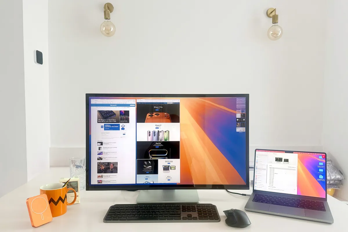 The Alogic Clarity 6K Touch monitor sits on a desk with its folding stand deployed.
