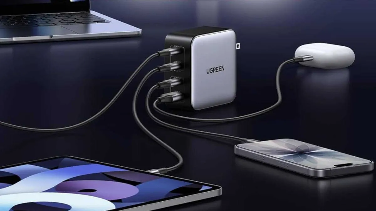 The Ugreen Nexode 100W GaN charger features four ports in a compact palm-sized design.