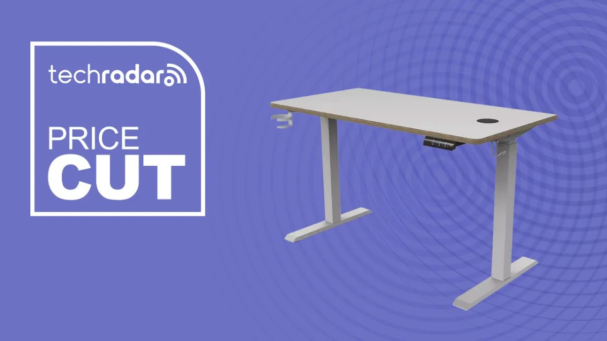 Koble Gino single-motor sit-stand desk with wireless charging and USB ports.