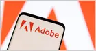 Adobe corporate logo displayed on a computer monitor screen