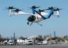 A Joby electric air taxi hovers over Manhattan during a public demonstration.