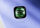The interface shows Spotify profile customization options for editing usernames and adding bios with privacy controls.