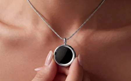 The Gem smart pendant necklace tracks real-time UVA and UVB exposure to manage daily sunlight intake.