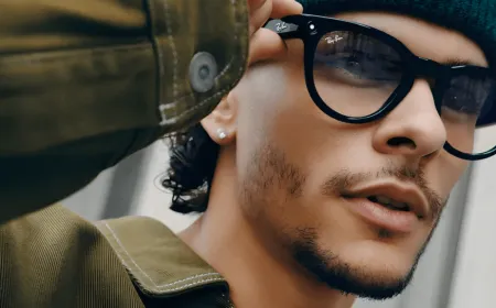 A person wears Meta smart glasses equipped with facial recognition technology.