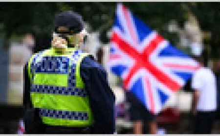 UK police officers reviewing court documents amid new AI usage restrictions