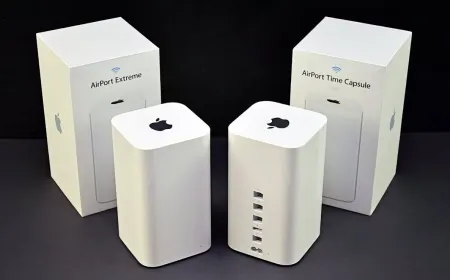 Apple Time Capsule network storage device next to a Mac computer running macOS 27.