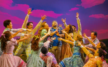 Apple TV representatives receiving Tony Awards for the Broadway adaptation of Schmigadoon!