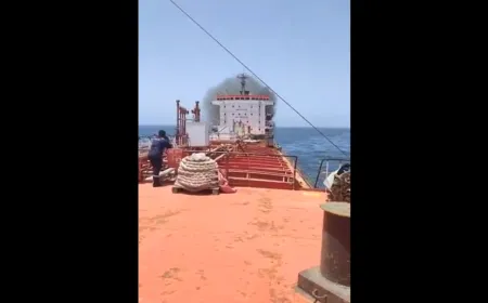 Helicopter rescue operation extracting sailors from the burning MT Marivex tanker near Oman.