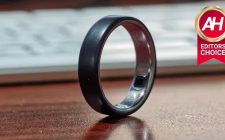 The Oura Ring 5 features a minimalist metallic band with integrated biometric sensors for continuous tracking.