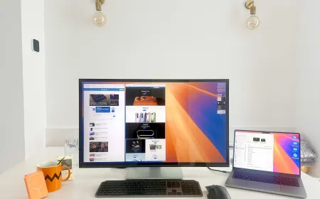 The Alogic Clarity 6K touchscreen monitor is shown with its adjustable fold stand.
